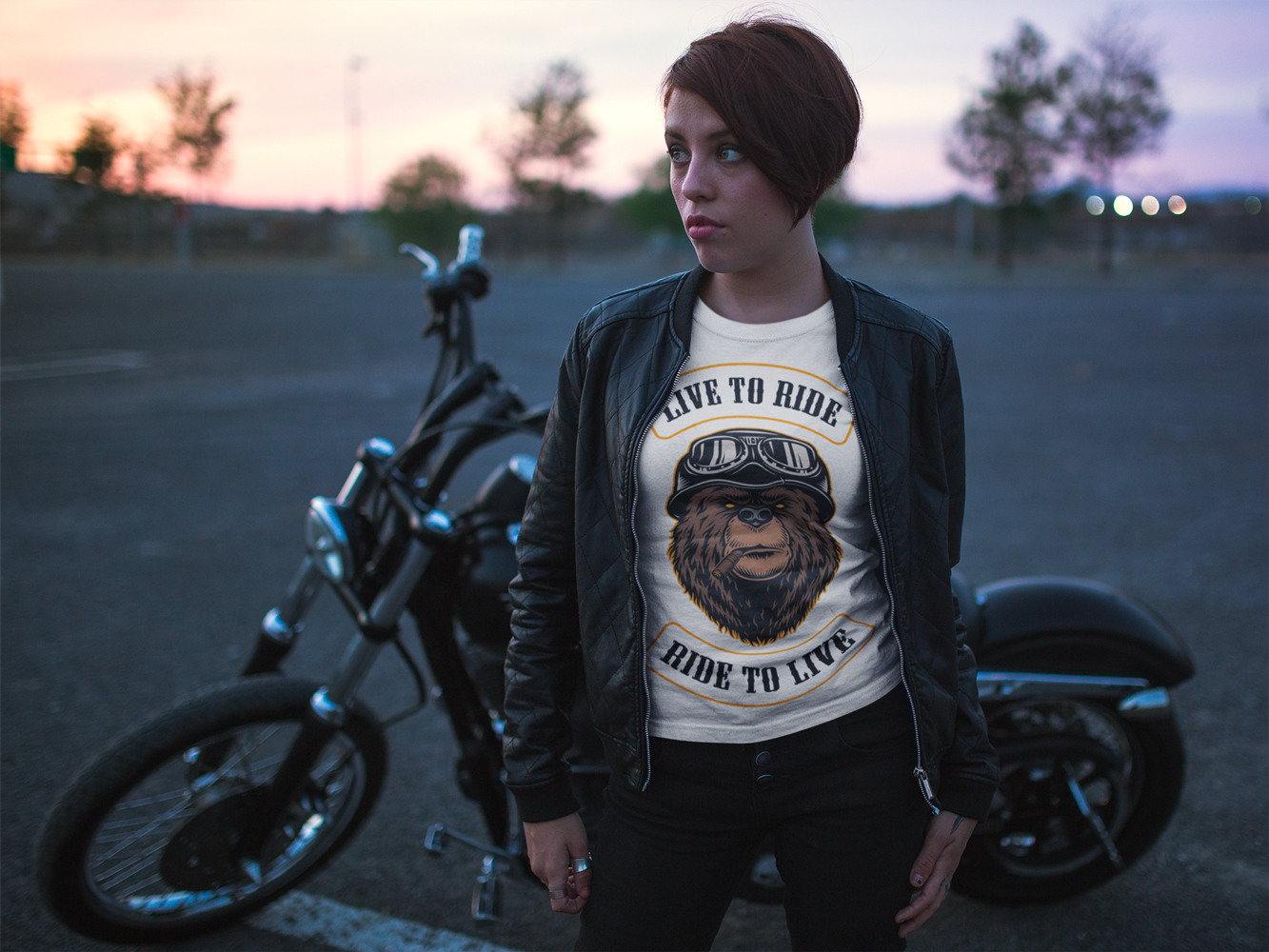 t-shirt-mockup-of-a-short-hair-biker-girl-at-a-parking-lot-with-her-bike-20257.jpg